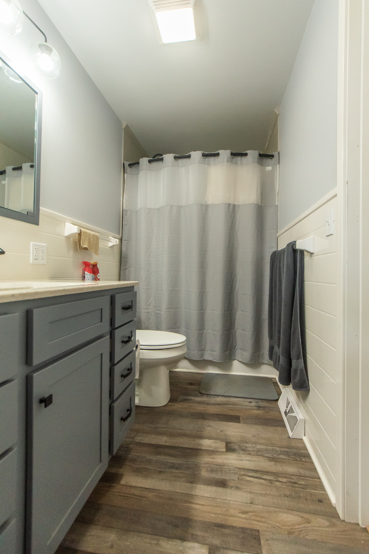 1751 Maples Road Dixon, IL 61021 - Photo 18 of 23 a bathroom with a sink toilet and shower