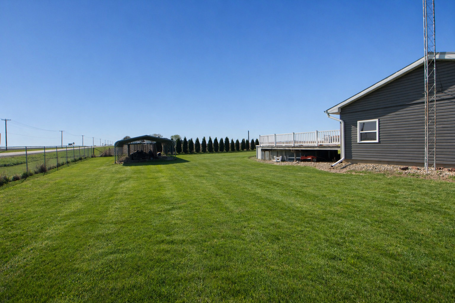 1751 Maples Road Dixon, IL 61021 - Photo 3 of 23 a backyard of a house with lots of green space