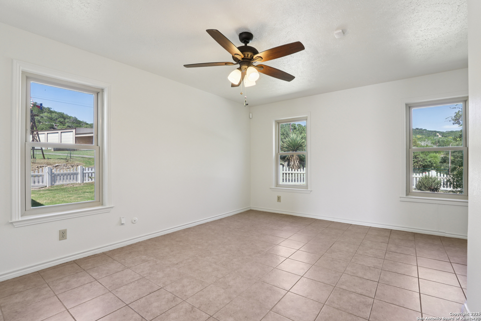 4380 Bear Springs Road Pipe Creek, TX 78063 - Photo 15 of 60 a view of an empty room with a window