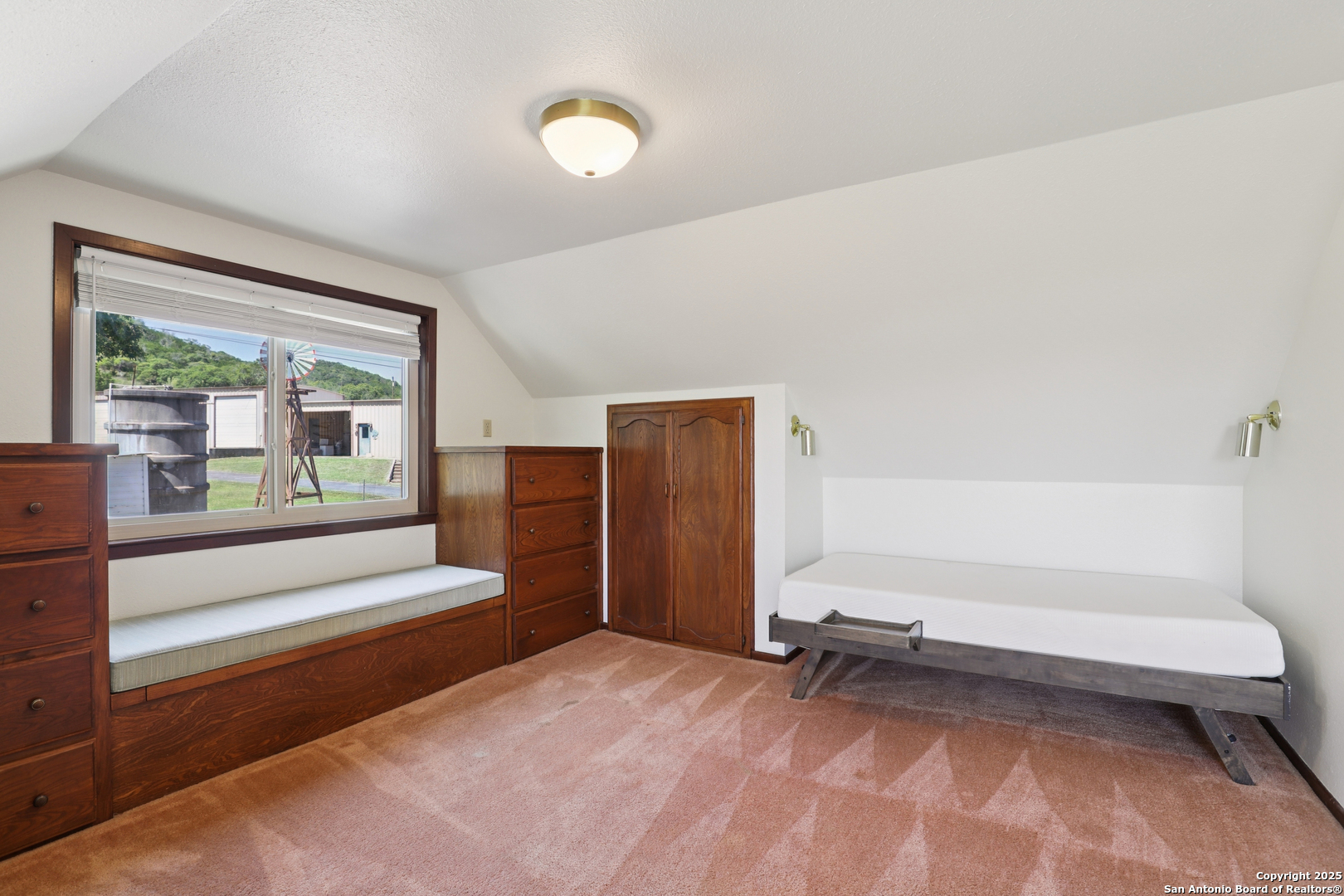4380 Bear Springs Road Pipe Creek, TX 78063 - Photo 26 of 60 a view of room with furniture and a window