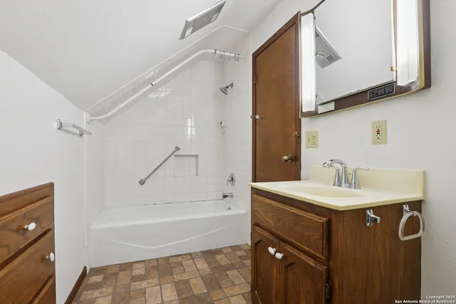 a view of a swimming pool with a yard