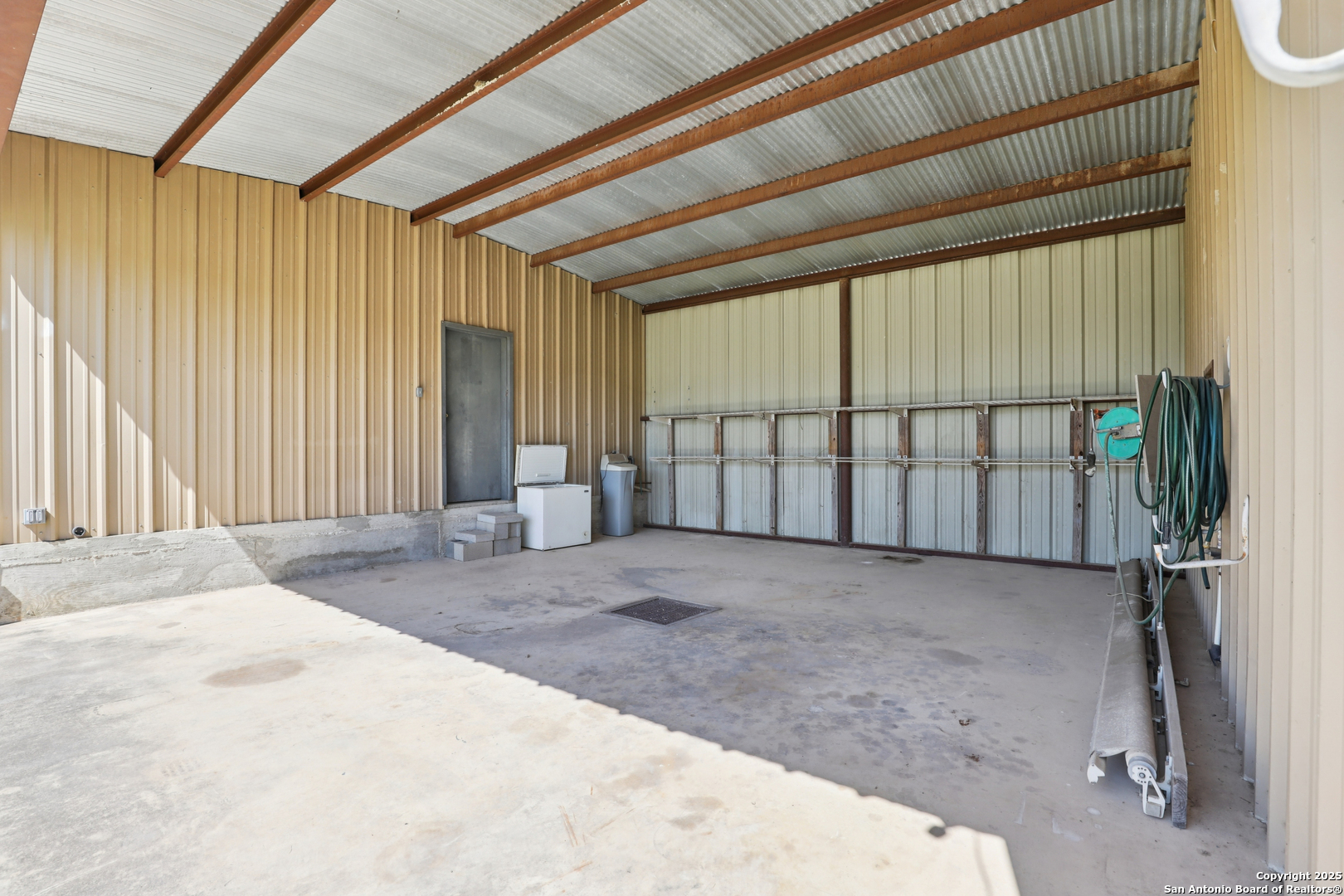 4380 Bear Springs Road Pipe Creek, TX 78063 - Photo 39 of 60 a view of an empty room with a window