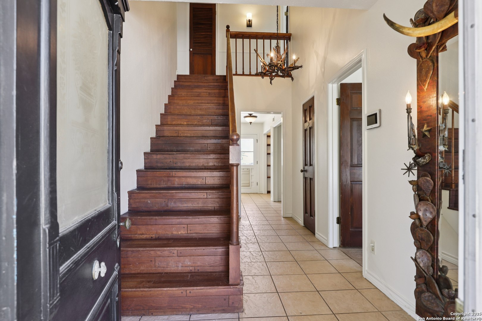 4380 Bear Springs Road Pipe Creek, TX 78063 - Photo 5 of 60 a view of a hallway with wooden floor and entryway
