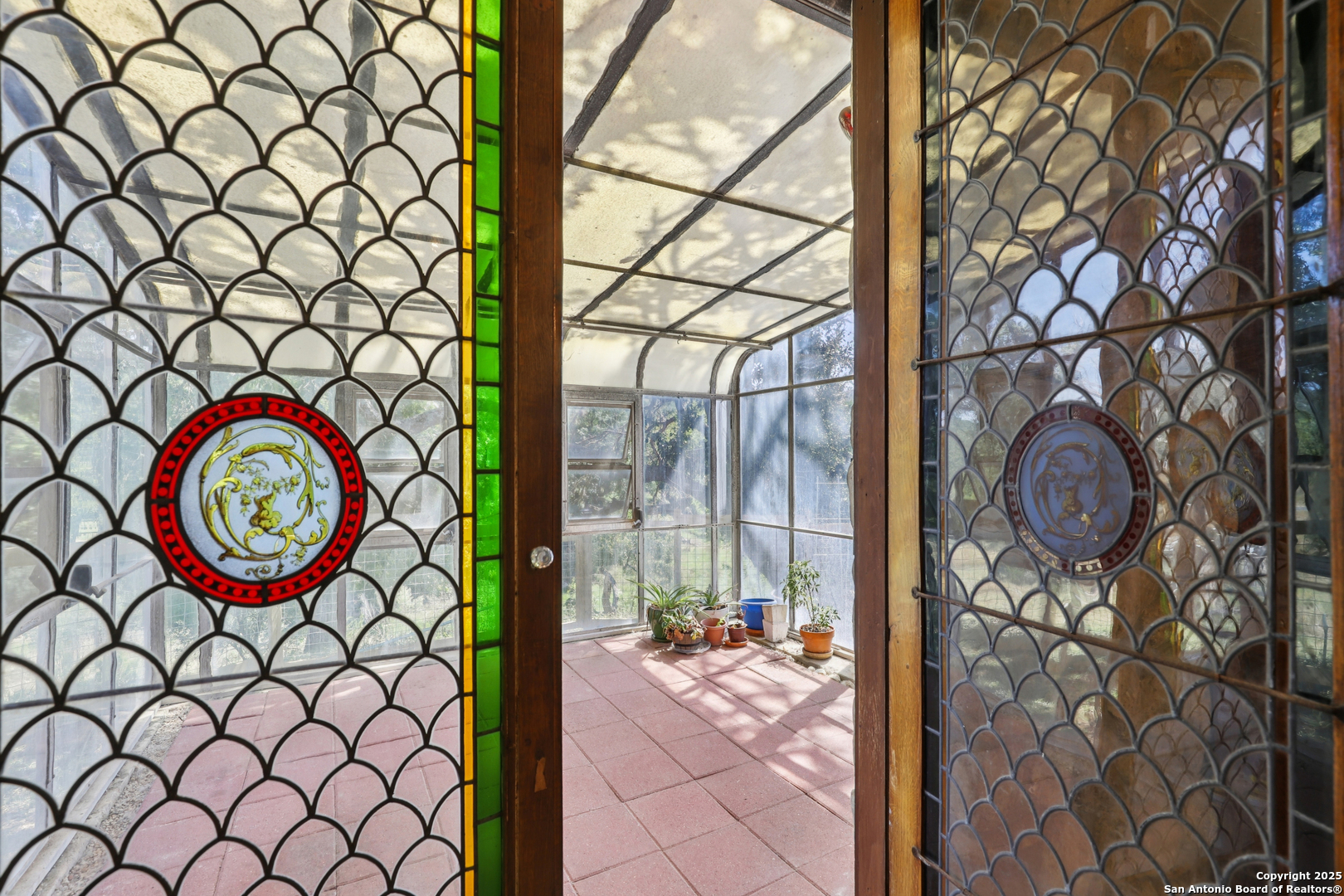 4380 Bear Springs Road Pipe Creek, TX 78063 - Photo 9 of 60 a view of a wooden bench and next to a window