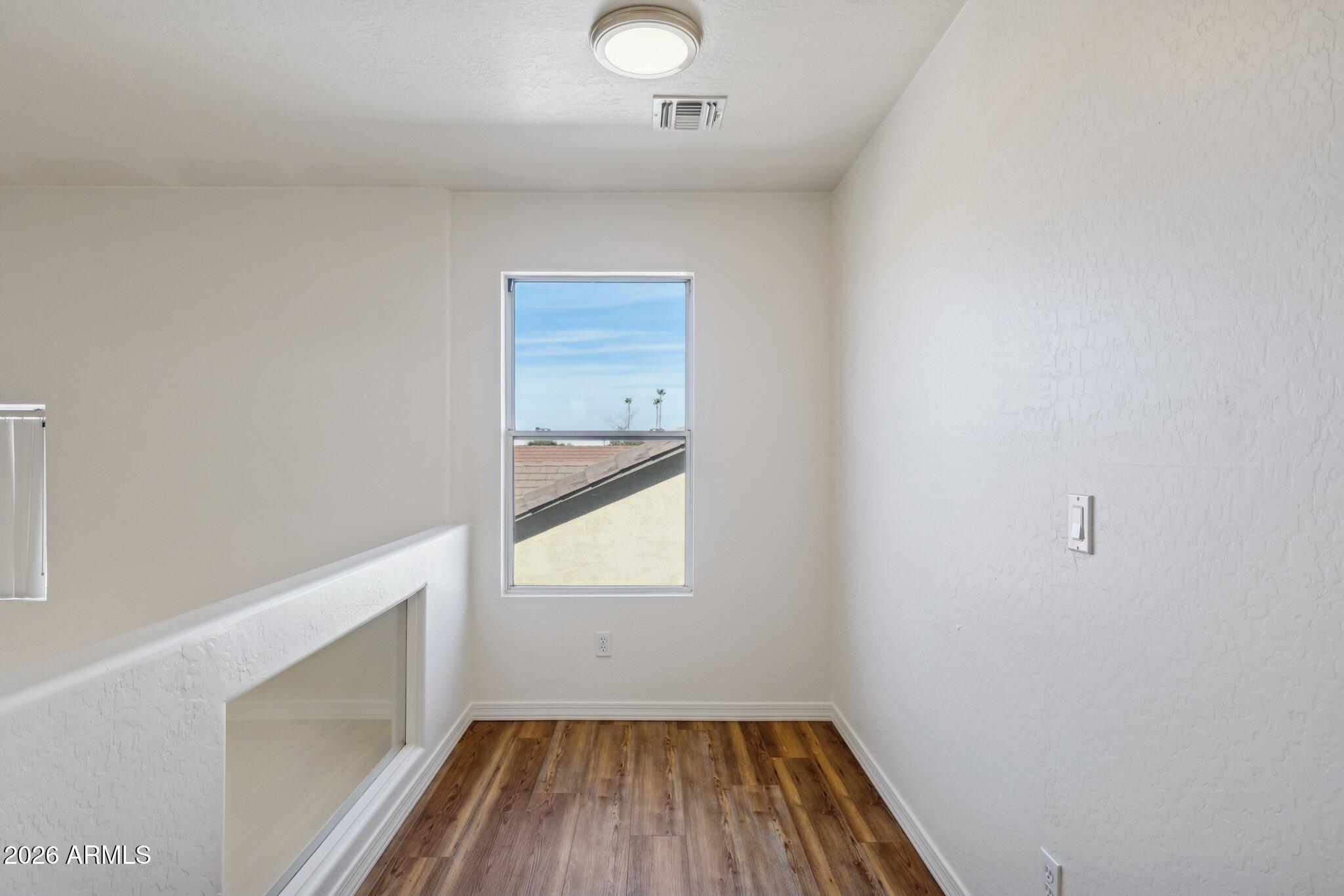 4034 East Chambers Street Phoenix, AZ 85040 - Photo 12 of 26 a view of room with window