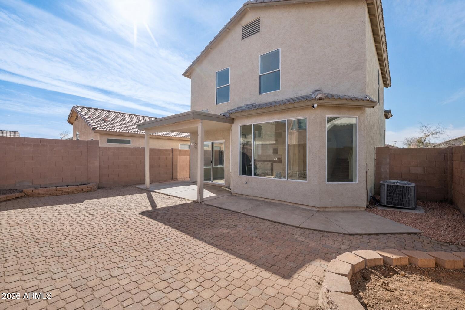 4034 East Chambers Street Phoenix, AZ 85040 - Photo 23 of 26 Sunny backyard with terracotta details