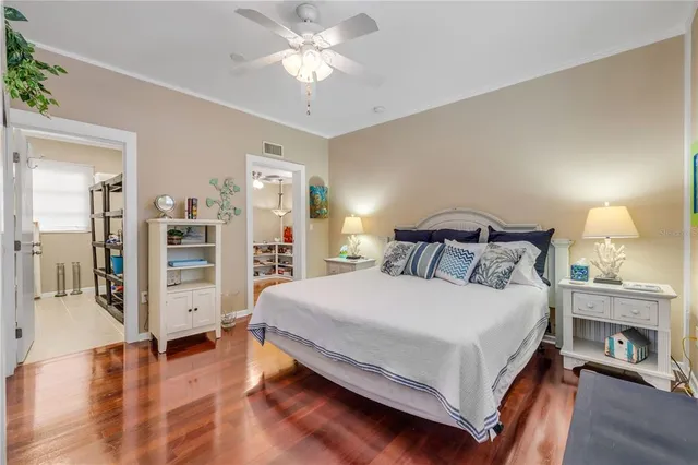 a bedroom with furniture and a window