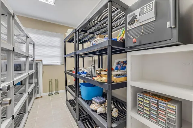 a living room with a couch and a window