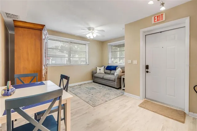 a kitchen with stainless steel appliances a refrigerator and a sink