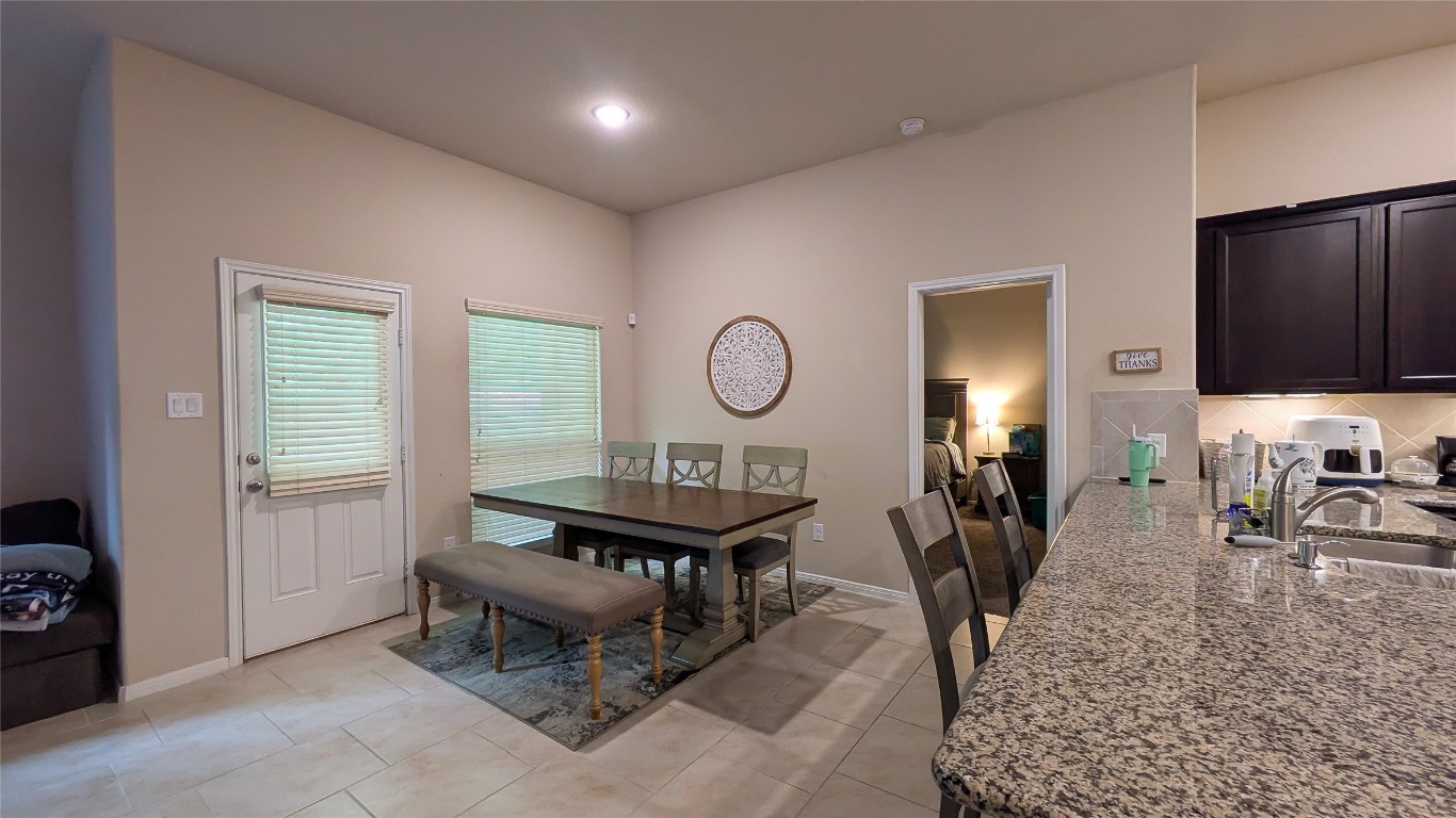 22330 Forbes Field Trail Spring, TX 77389 - Photo 3 of 8 a living room with furniture a flat screen tv and a window