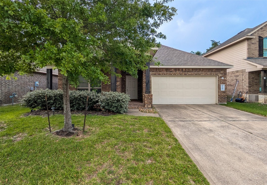 22330 Forbes Field Trail Spring, TX 77389 - Photo 7 of 8 a view of backyard of house with green space