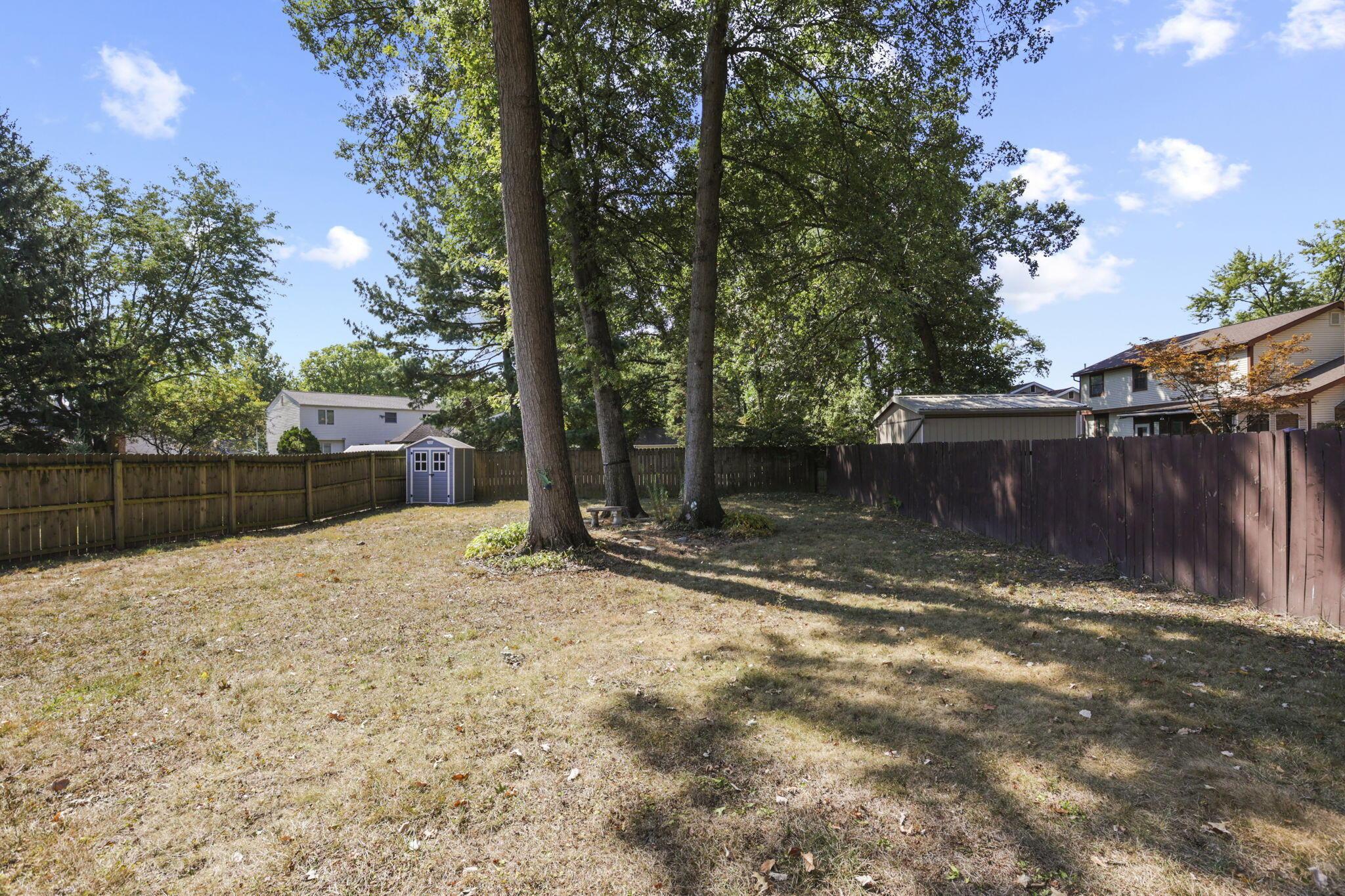 325 Rimbey Avenue Columbus, OH 43230 - Photo 48 of 50 Backyard w/mature trees