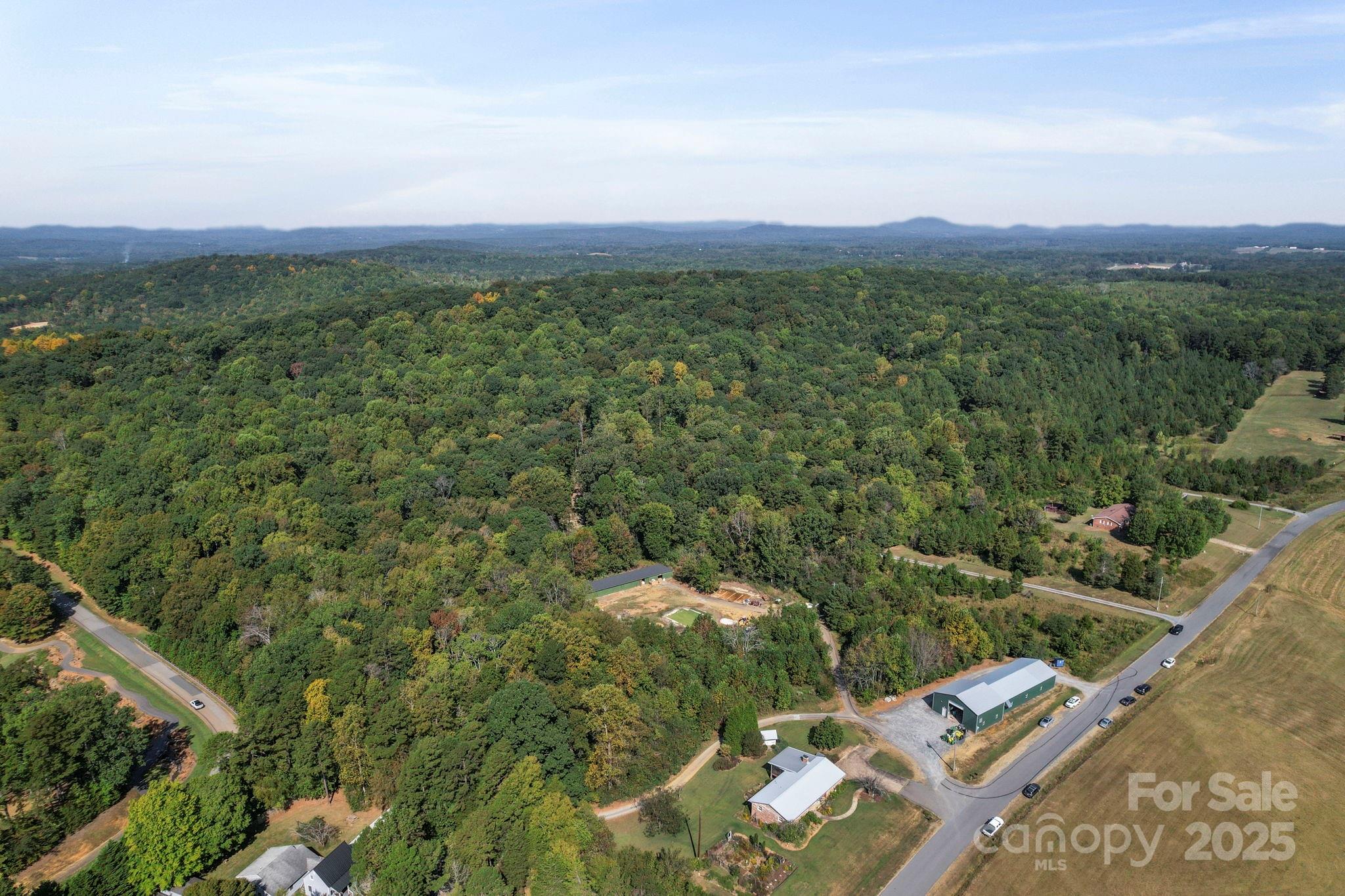 2272 Doul Mountain Road Asheboro, NC 27205 - Photo 11 of 27 an aerial view of a city