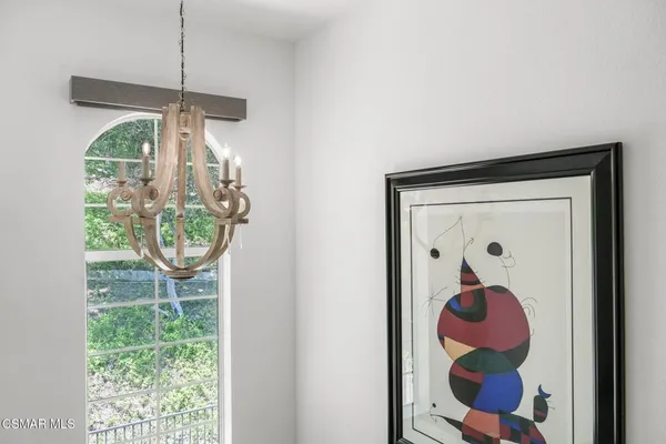 a front view of a house dining room and window