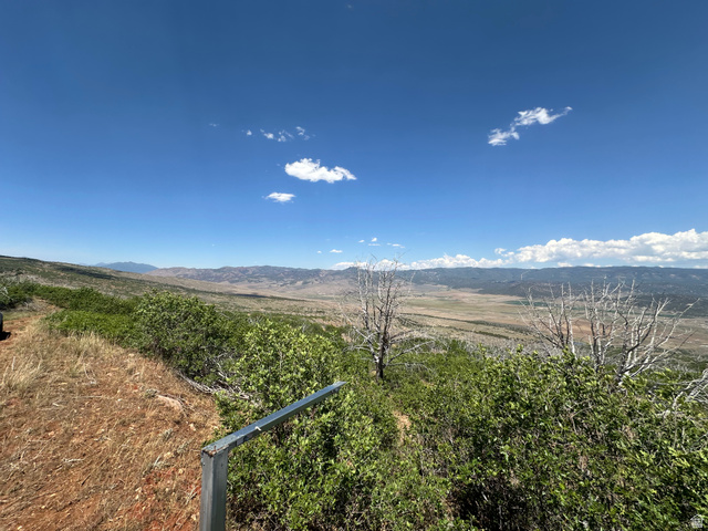 25 North Indian Ridge Drive East, Unit R25 Fairview, UT 84629 - Photo 1 of 3 Expansive natural landscape under a clear blue sky, featuring distant mountains and broad plains