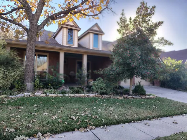 front view of house with a yard