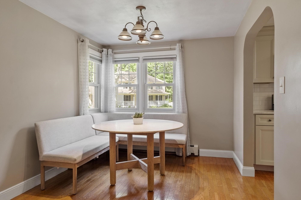167 Gates Pond Road Berlin, MA 01503 - Photo 10 of 32 a dining room with furniture window wooden floor