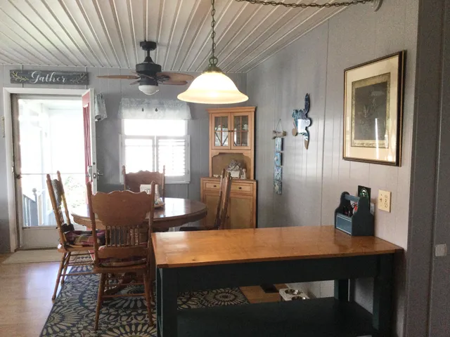 a view of a dining room with furniture