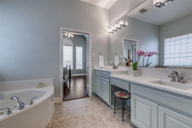 a bedroom with a bed and a large dresser