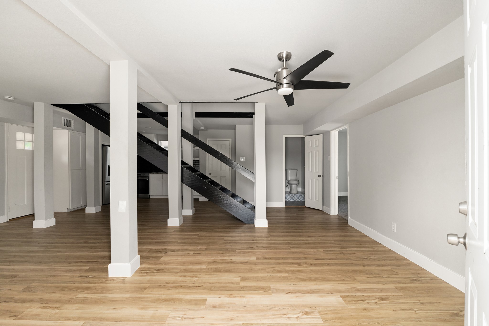 a view of a hallway view with staircase