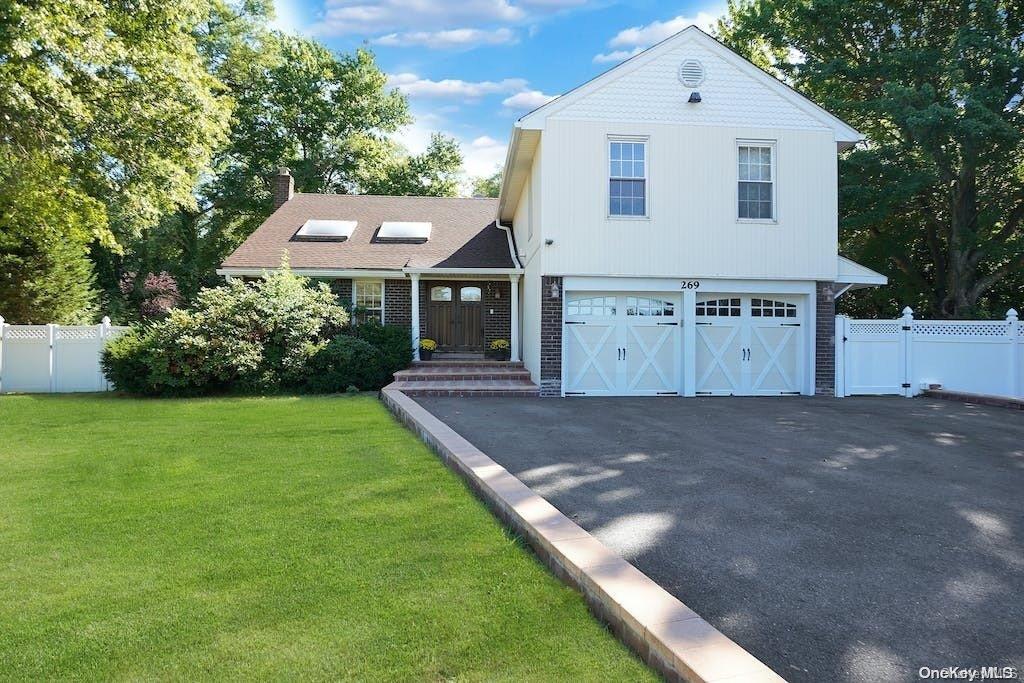 269 Walnut Road Glen Cove, NY 11542 - Photo 1 of 1 a view of a house with a yard