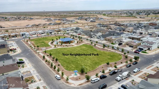an aerial view of a residential building and lake view