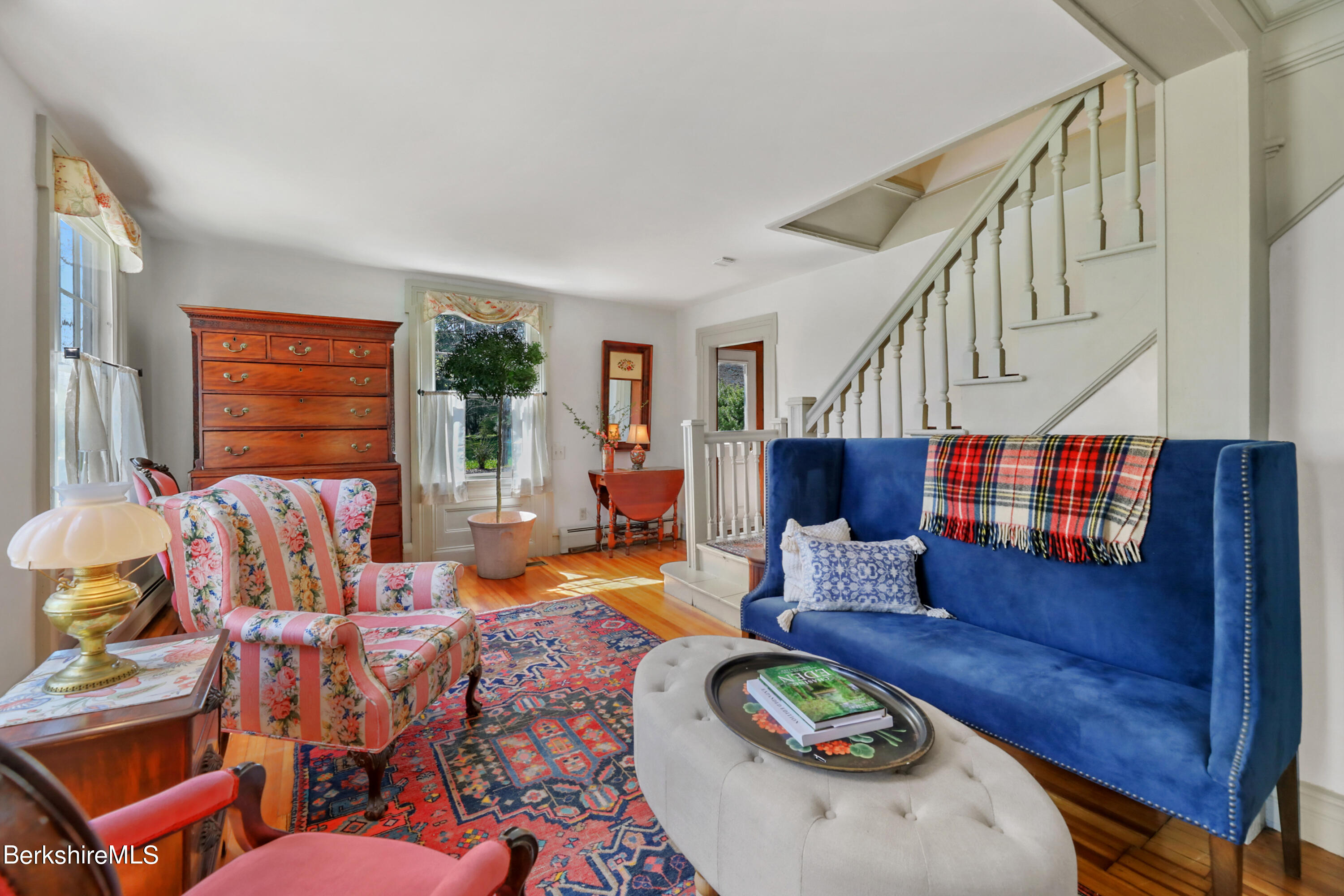 575 Sheffield Plain Sheffield, MA 01257 - Photo 12 of 42 a living room with furniture and a wooden floor