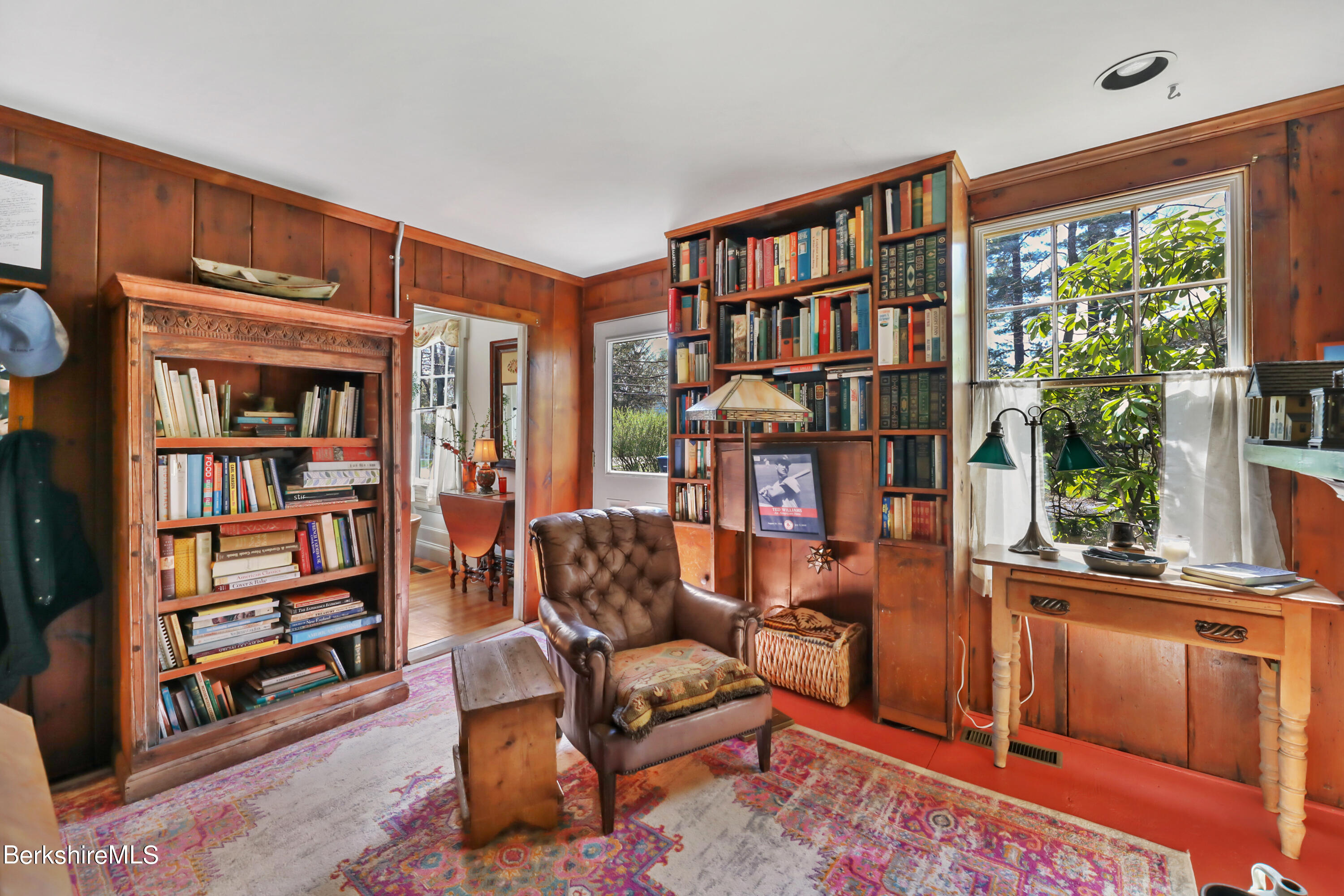 575 Sheffield Plain Sheffield, MA 01257 - Photo 20 of 42 a living room with furniture cabinets and a book shelf