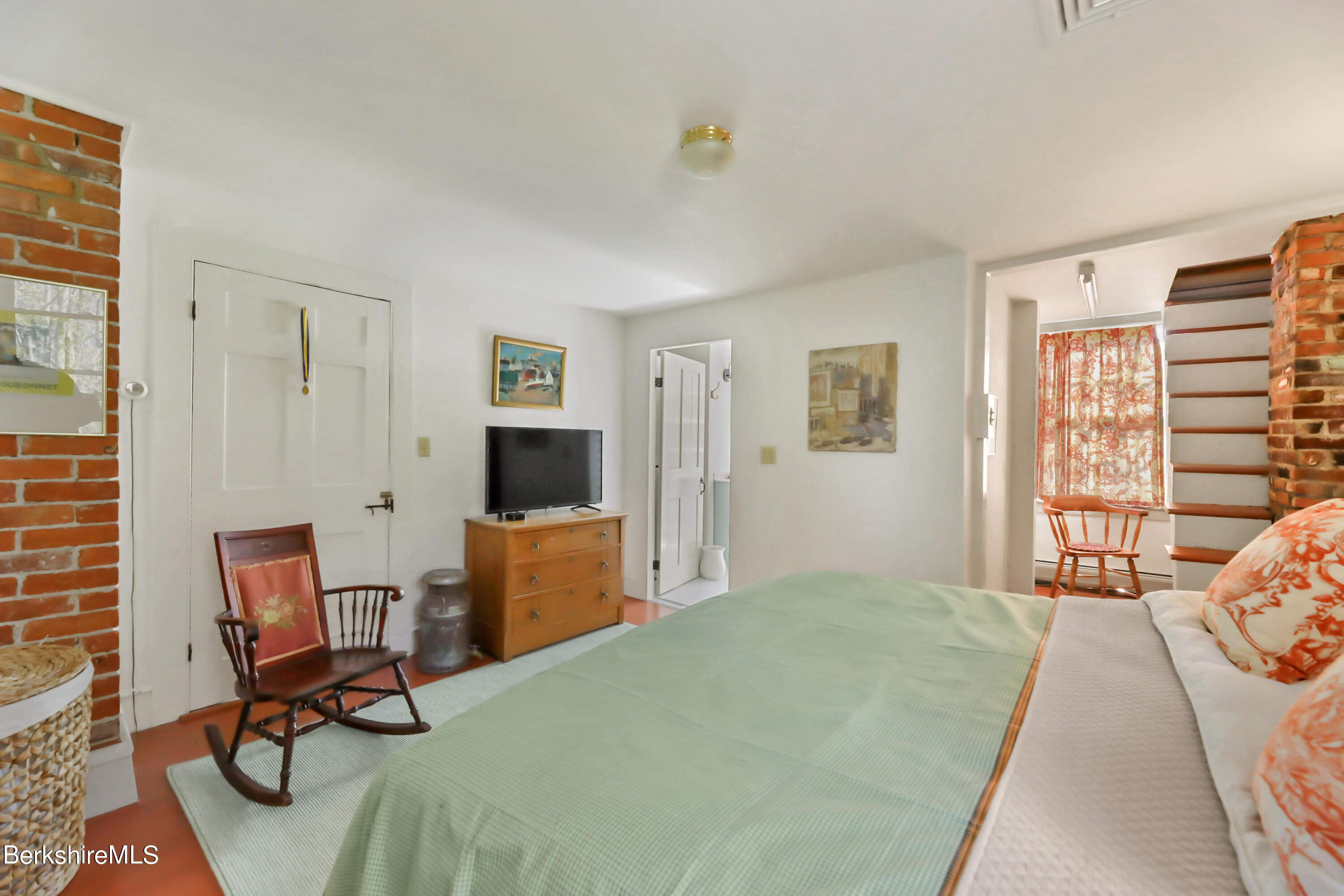 575 Sheffield Plain Sheffield, MA 01257 - Photo 25 of 42 a bedroom with a bed and a desk