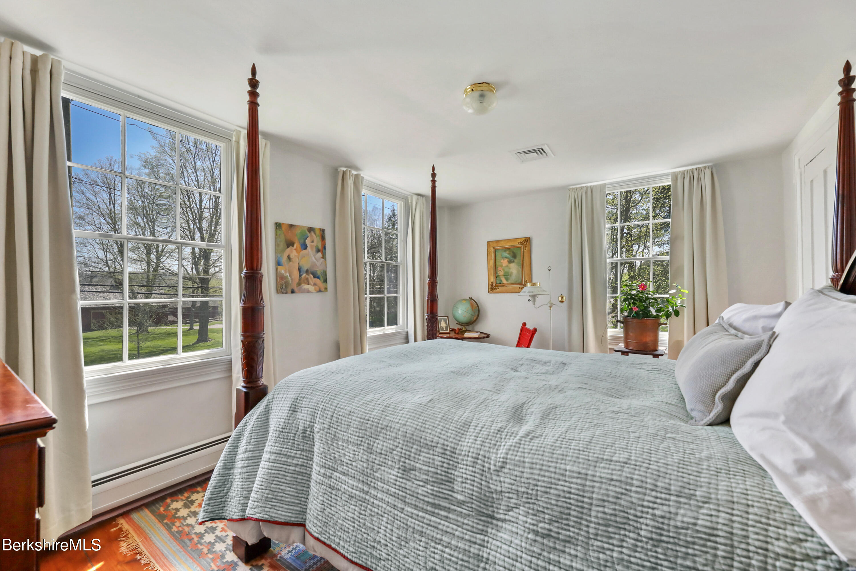 575 Sheffield Plain Sheffield, MA 01257 - Photo 32 of 42 a bedroom with a large bed and a window