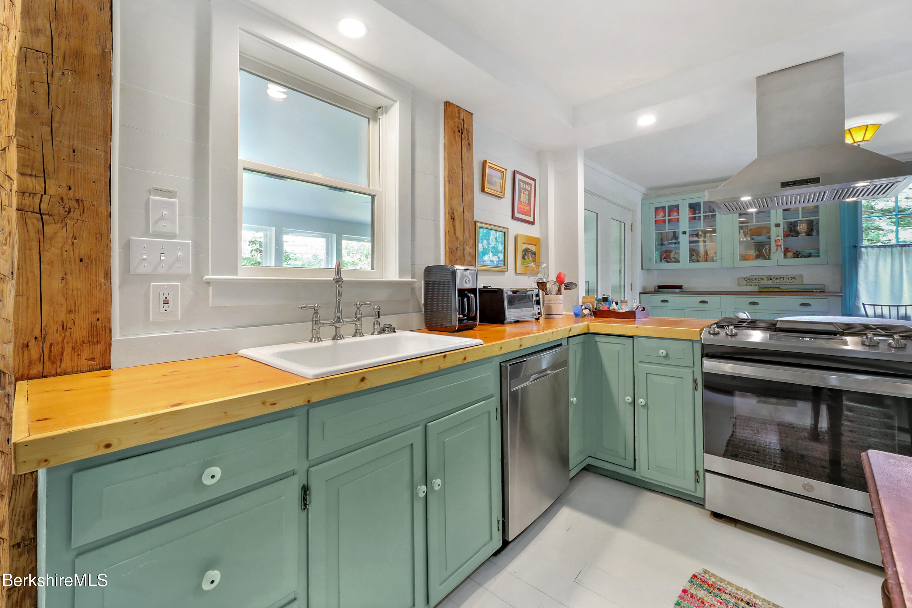 575 Sheffield Plain Sheffield, MA 01257 - Photo 6 of 42 a kitchen with stainless steel appliances granite countertop a sink and a stove