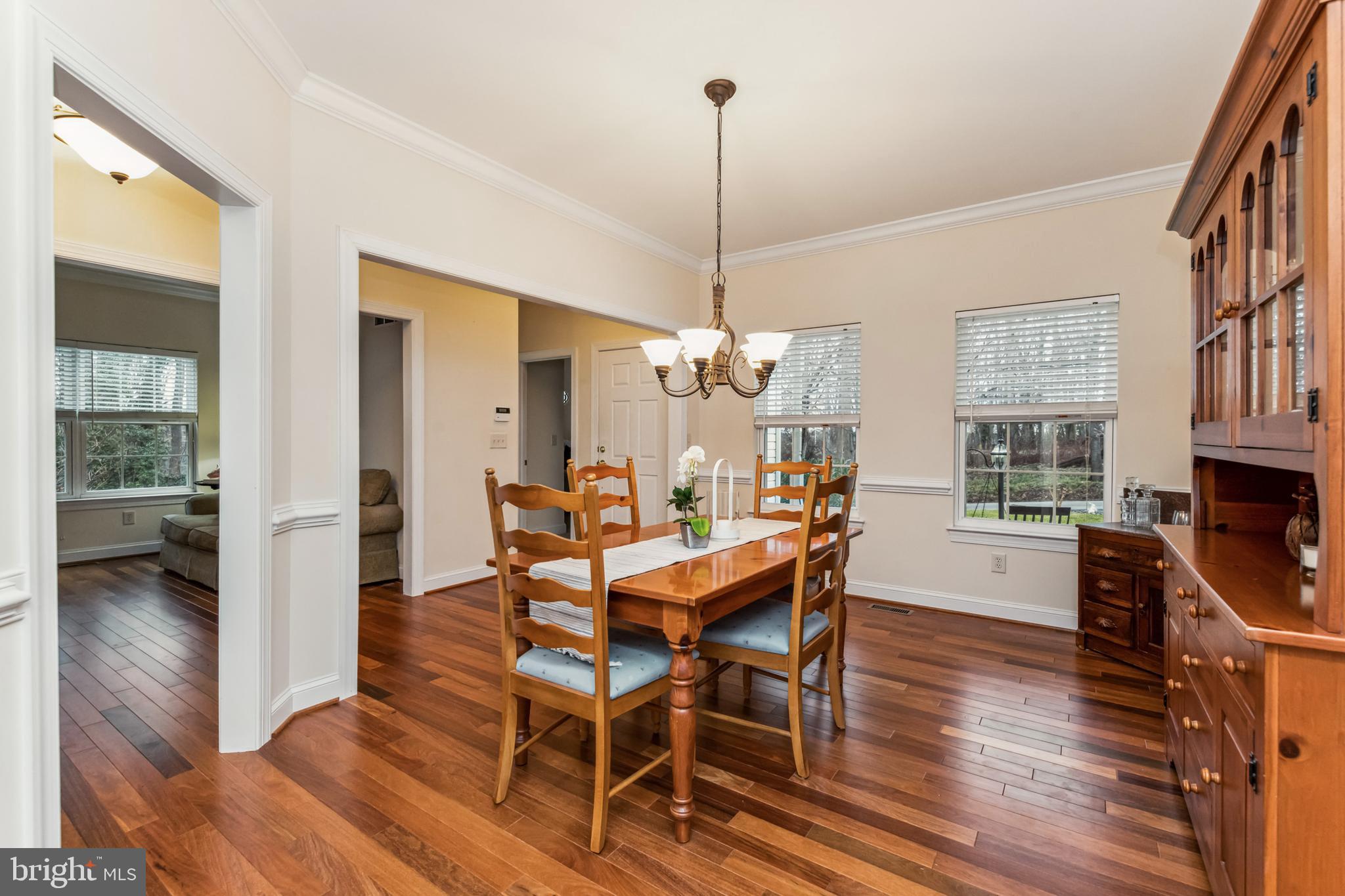 384 Forest Beach Road Annapolis, MD 21409 - Photo 6 of 44 Beautiful wood floors in dining room