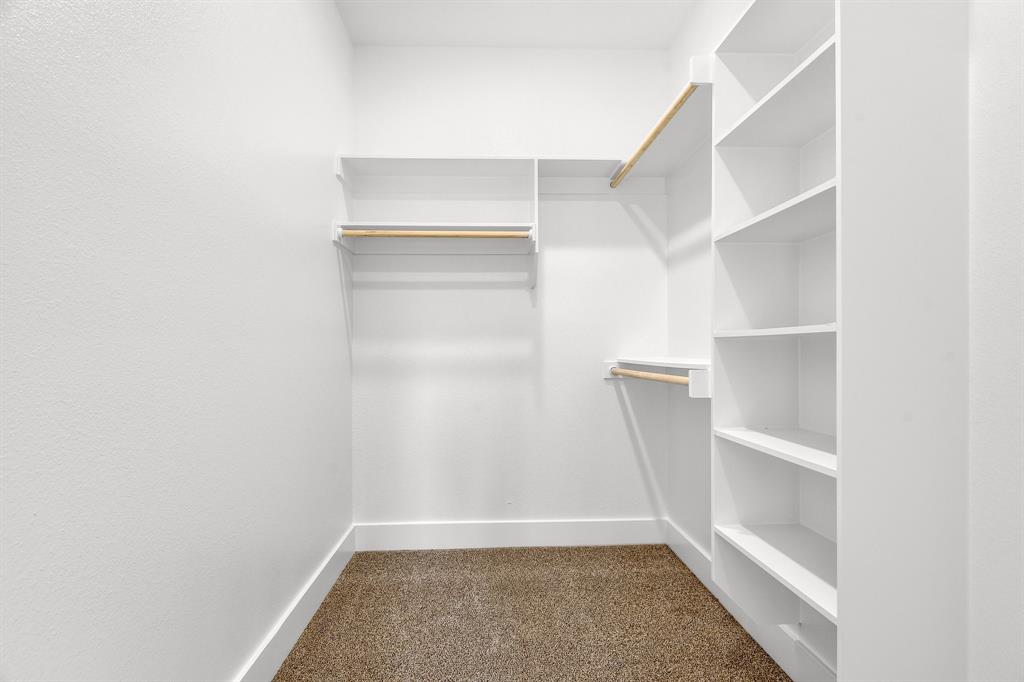 301 Anderson Street, Unit B Whitesboro, TX 76273 - Photo 11 of 16 a view of an empty walk in closet