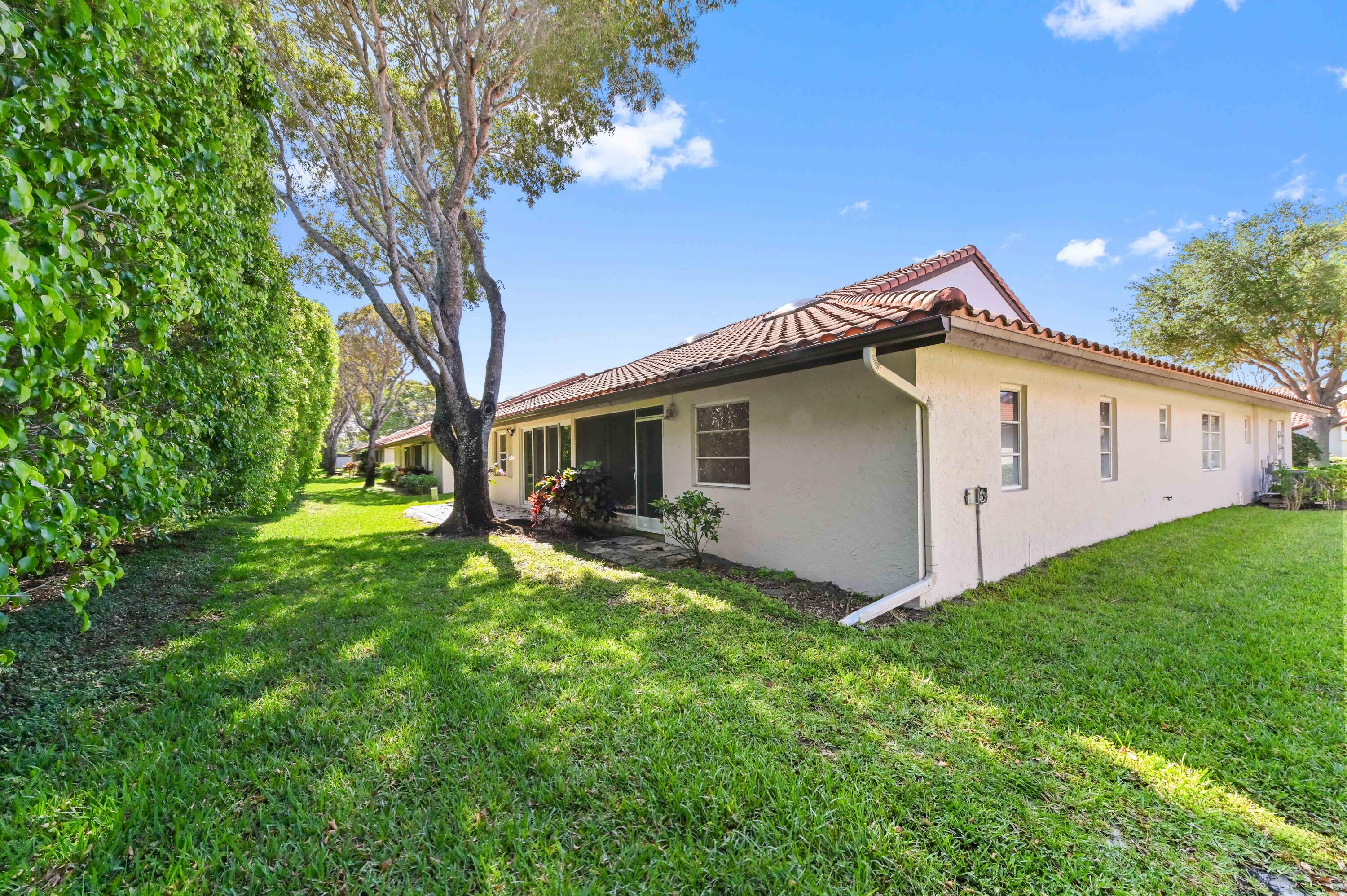 6040 Waldwick Circle Delray Beach, FL 33484 - Photo 27 of 75 a view of a house with backyard