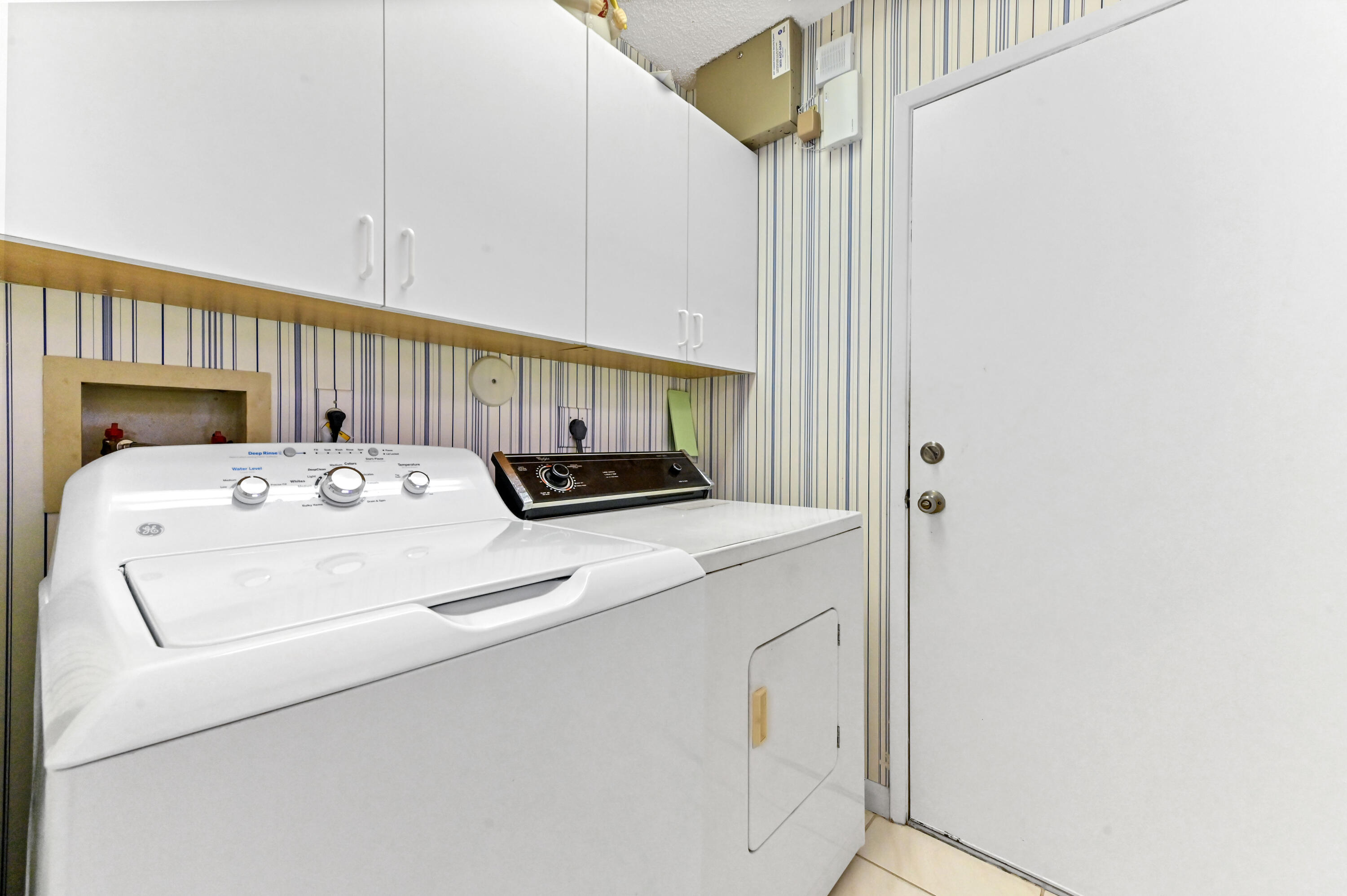 6040 Waldwick Circle Delray Beach, FL 33484 - Photo 10 of 75 a close view of washer and dryer