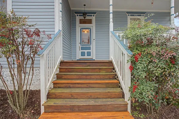 a view of entryway with flower pots