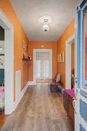 a view of an entryway with a livingroom