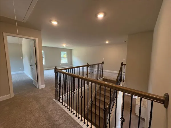 a view of a hallway with entryway