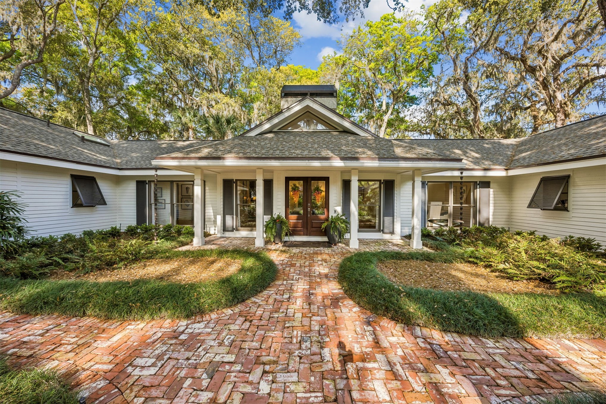 11 Red Maple Road Fernandina Beach, FL 32034 - Photo 1 of 70 a view of a house with backyard sitting area and garden