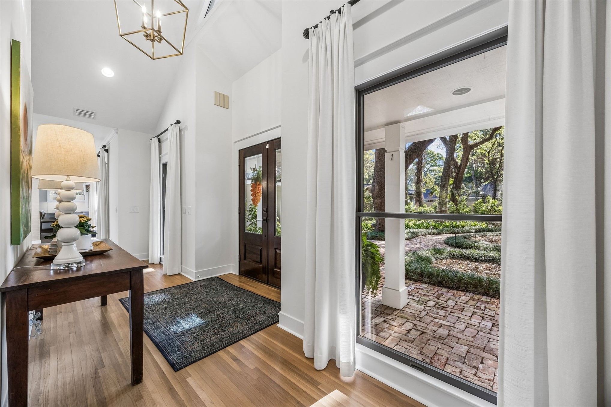 11 Red Maple Road Fernandina Beach, FL 32034 - Photo 6 of 70 a view of a hallway view with living room and dining room view