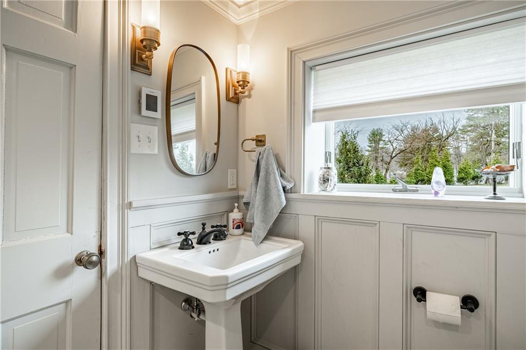 701 Oakbourne Road West Chester, PA 19382 - Photo 25 of 50 a bathroom with a sink and a mirror
