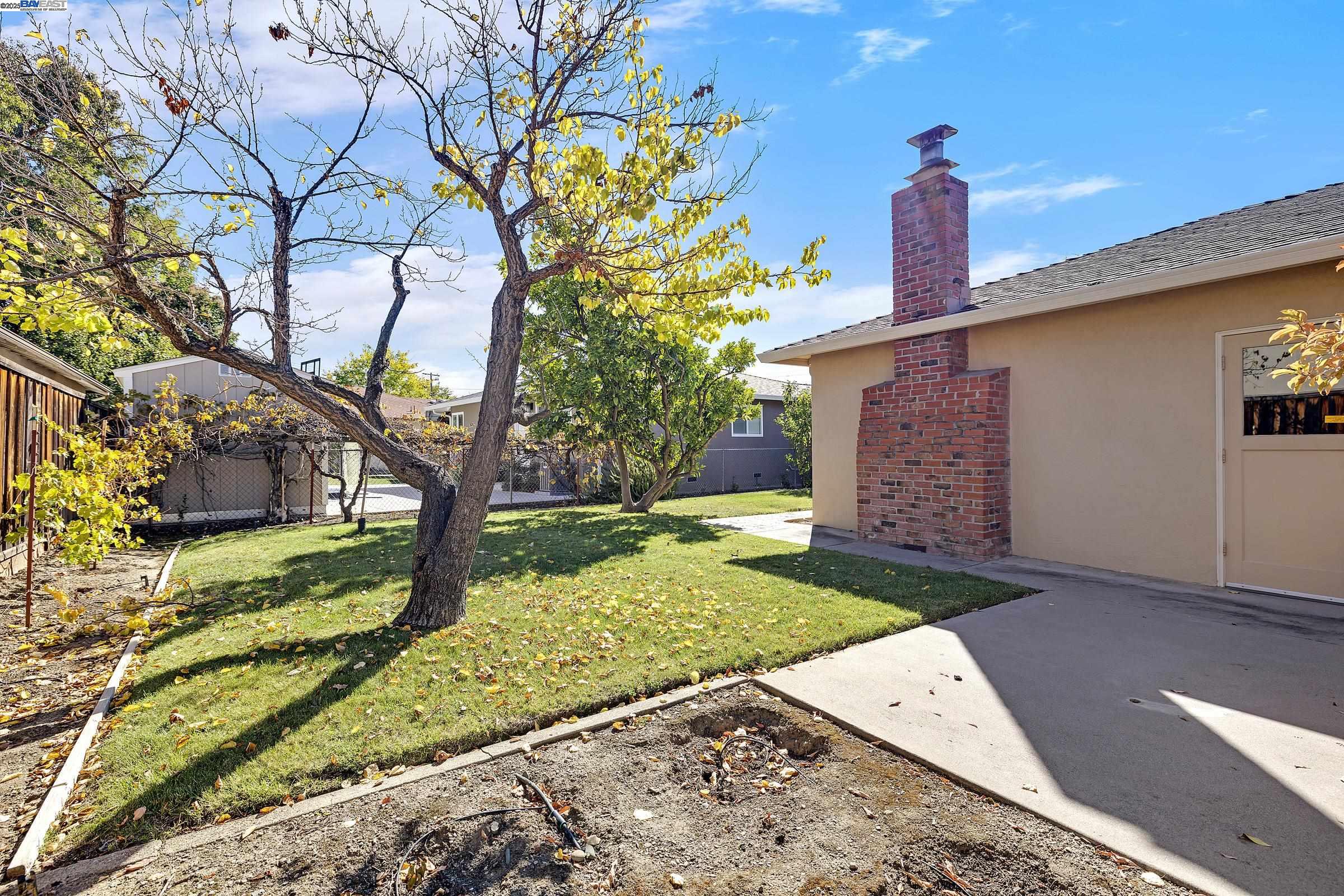 596 Tyler Avenue Livermore, CA 94550 - Photo 35 of 36 a front view of a house with garden