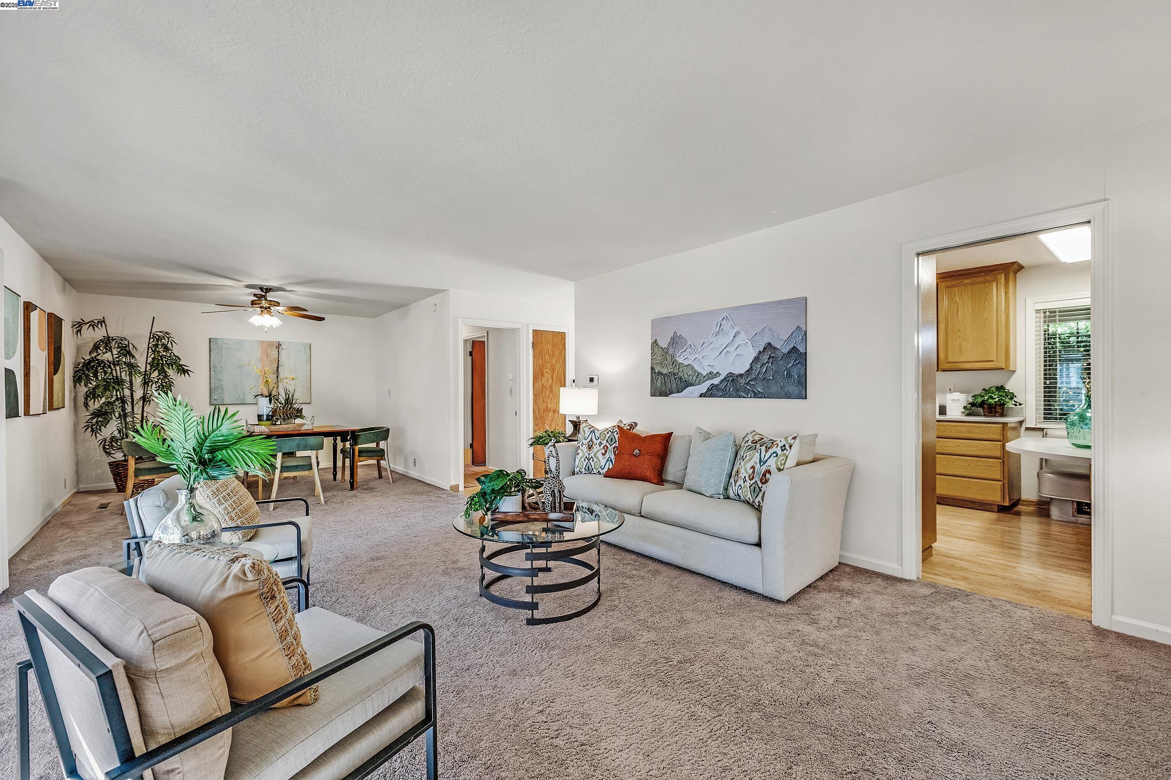 596 Tyler Avenue Livermore, CA 94550 - Photo 7 of 36 a living room with furniture and a couch