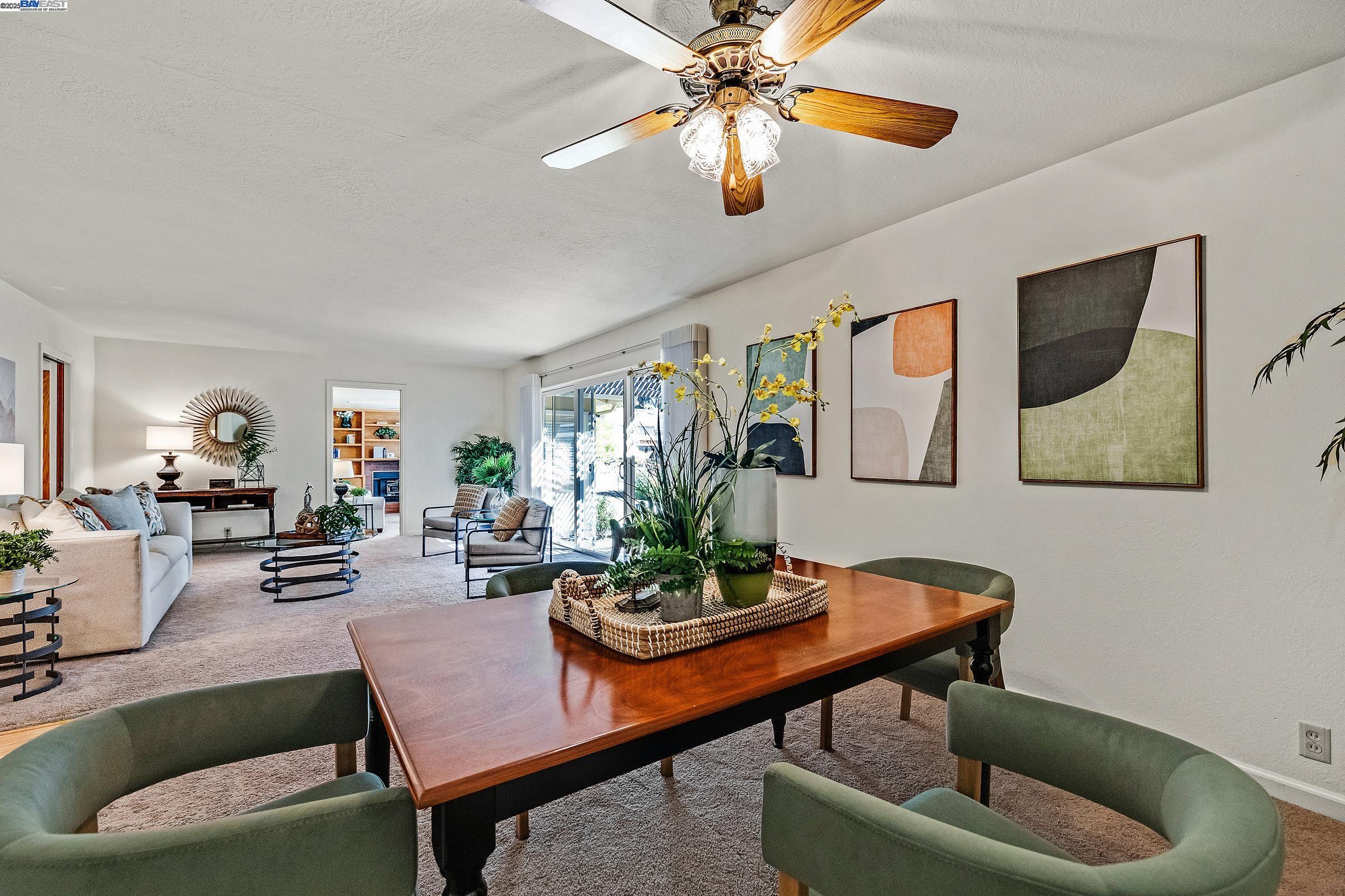 596 Tyler Avenue Livermore, CA 94550 - Photo 9 of 36 a living room with furniture and a potted plant