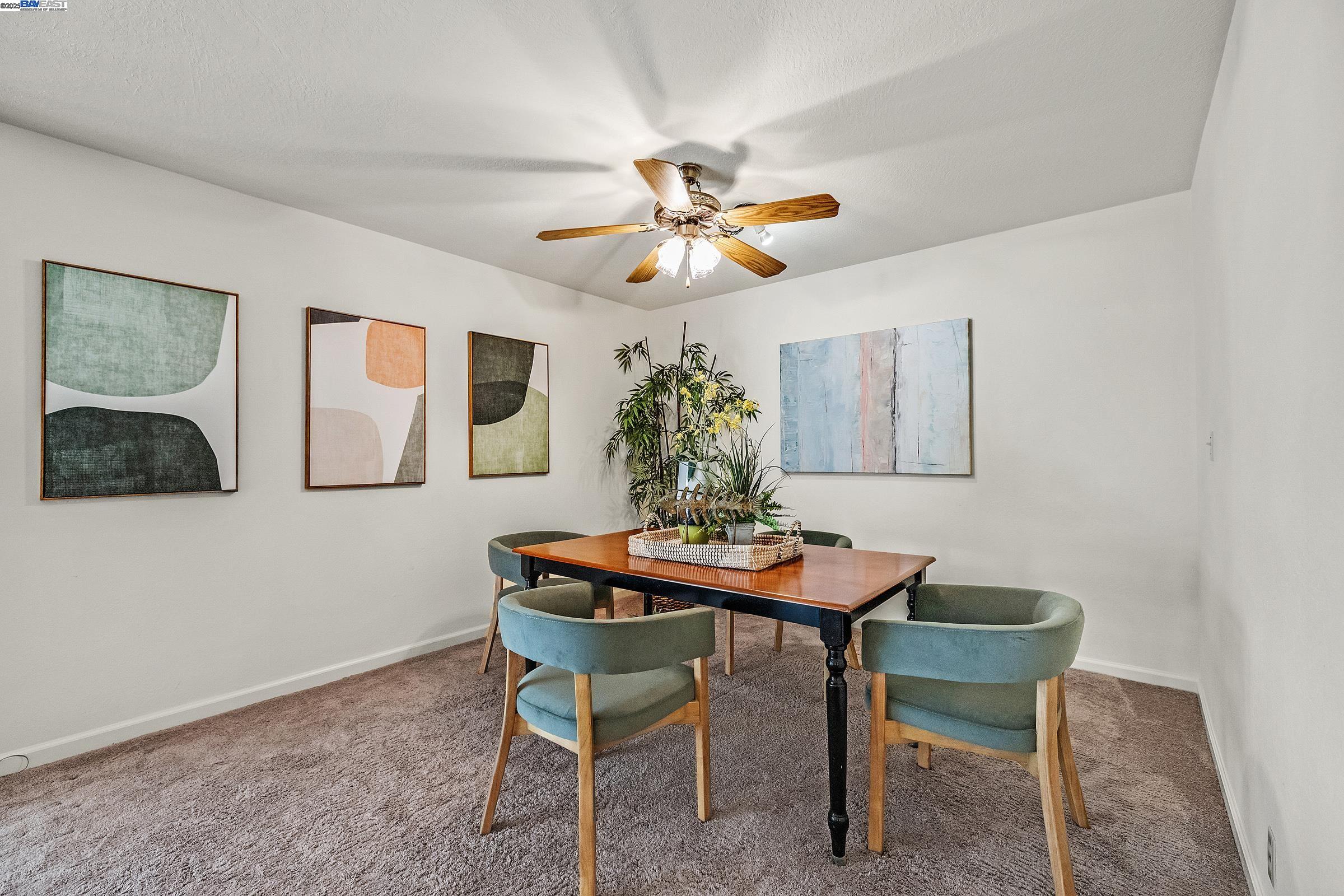 596 Tyler Avenue Livermore, CA 94550 - Photo 10 of 36 a dining room with furniture and window
