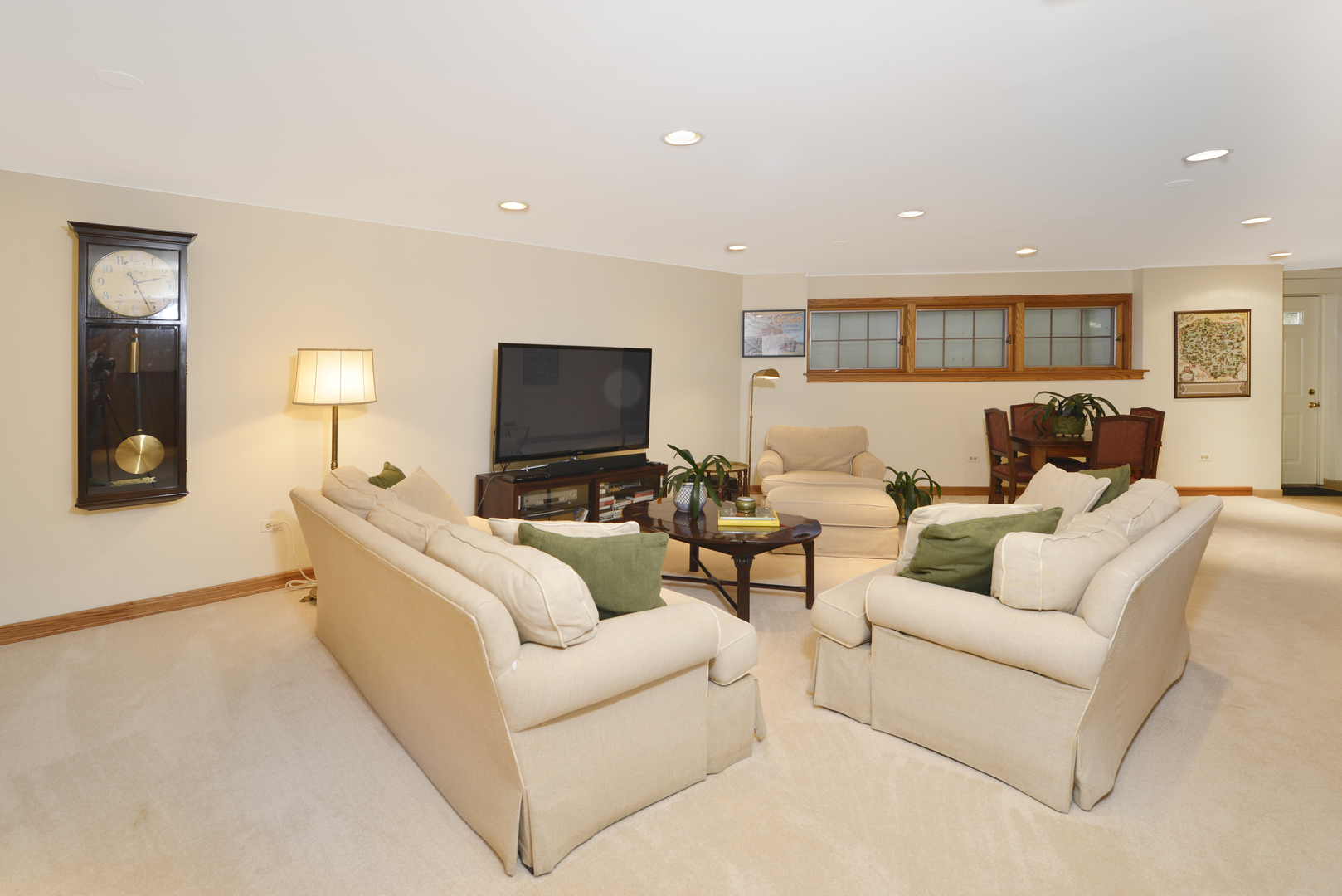 349 Sheridan Road Winnetka, IL 60093 - Photo 57 of 65 a living room with furniture and a flat screen tv