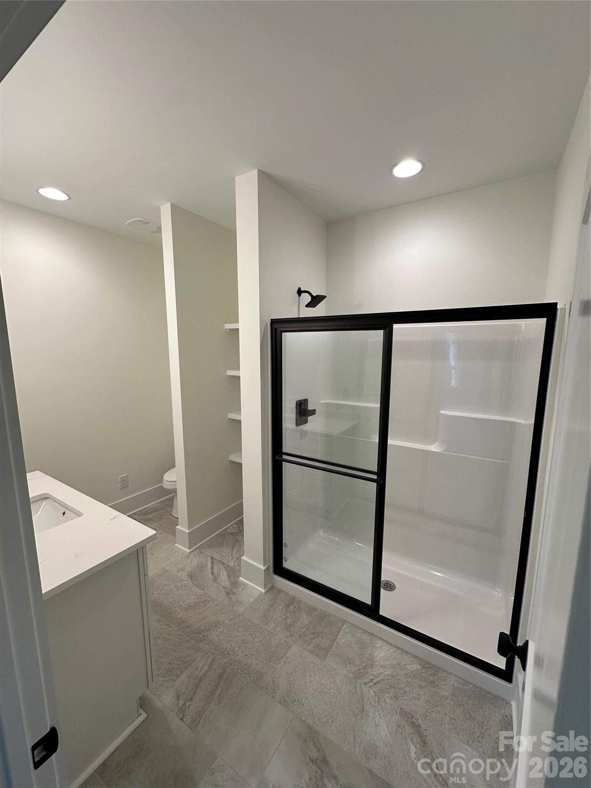 0 White Oaks Road, Unit 1 Mooresville, NC 28115 - Photo 22 of 27 a view of an empty room with a bathroom