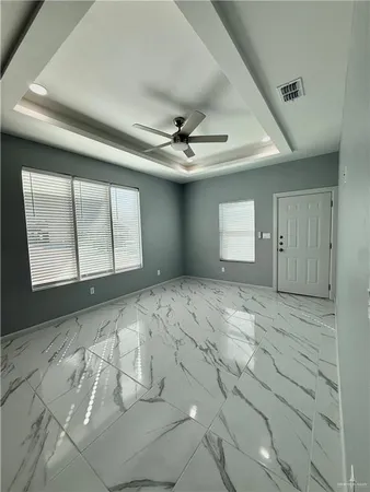 a view of a livingroom with a large window