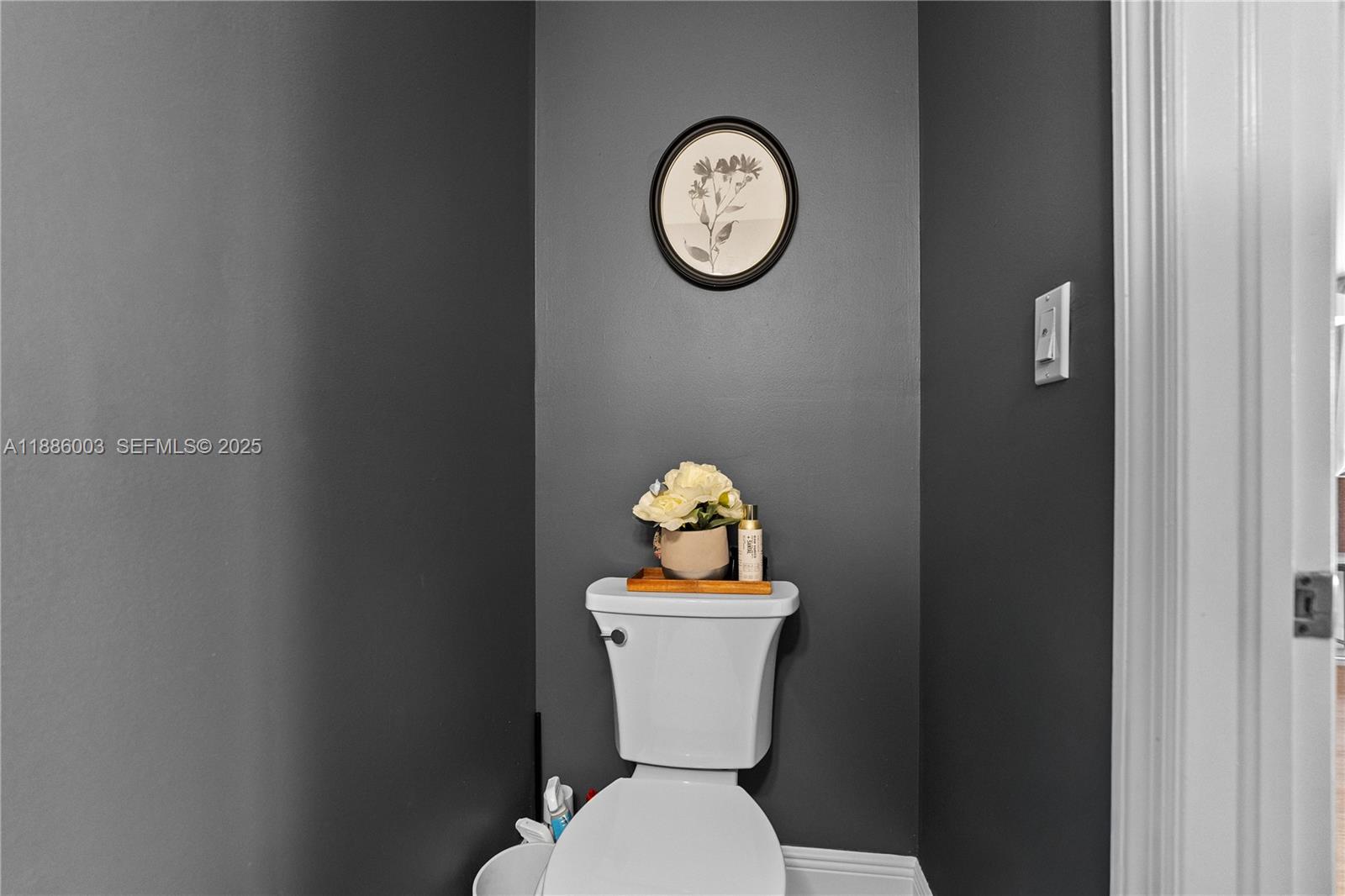 3070 Southwest 153rd Path Miami, FL 33185 - Photo 22 of 41 a bathroom with a toilet and a sink