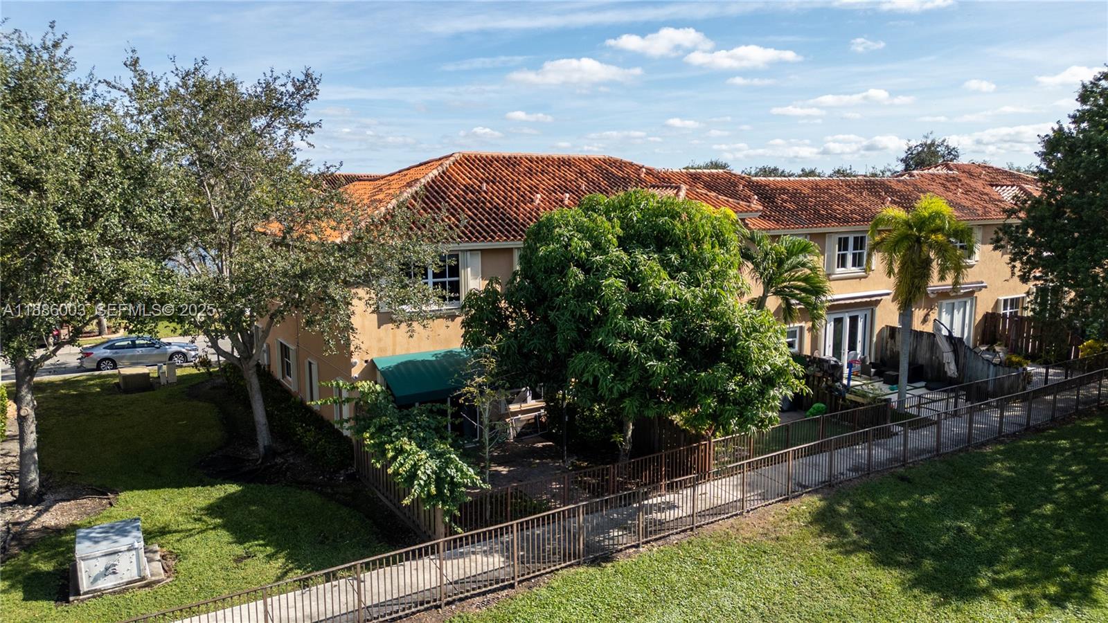 3070 Southwest 153rd Path Miami, FL 33185 - Photo 6 of 41 a view of a house with a yard